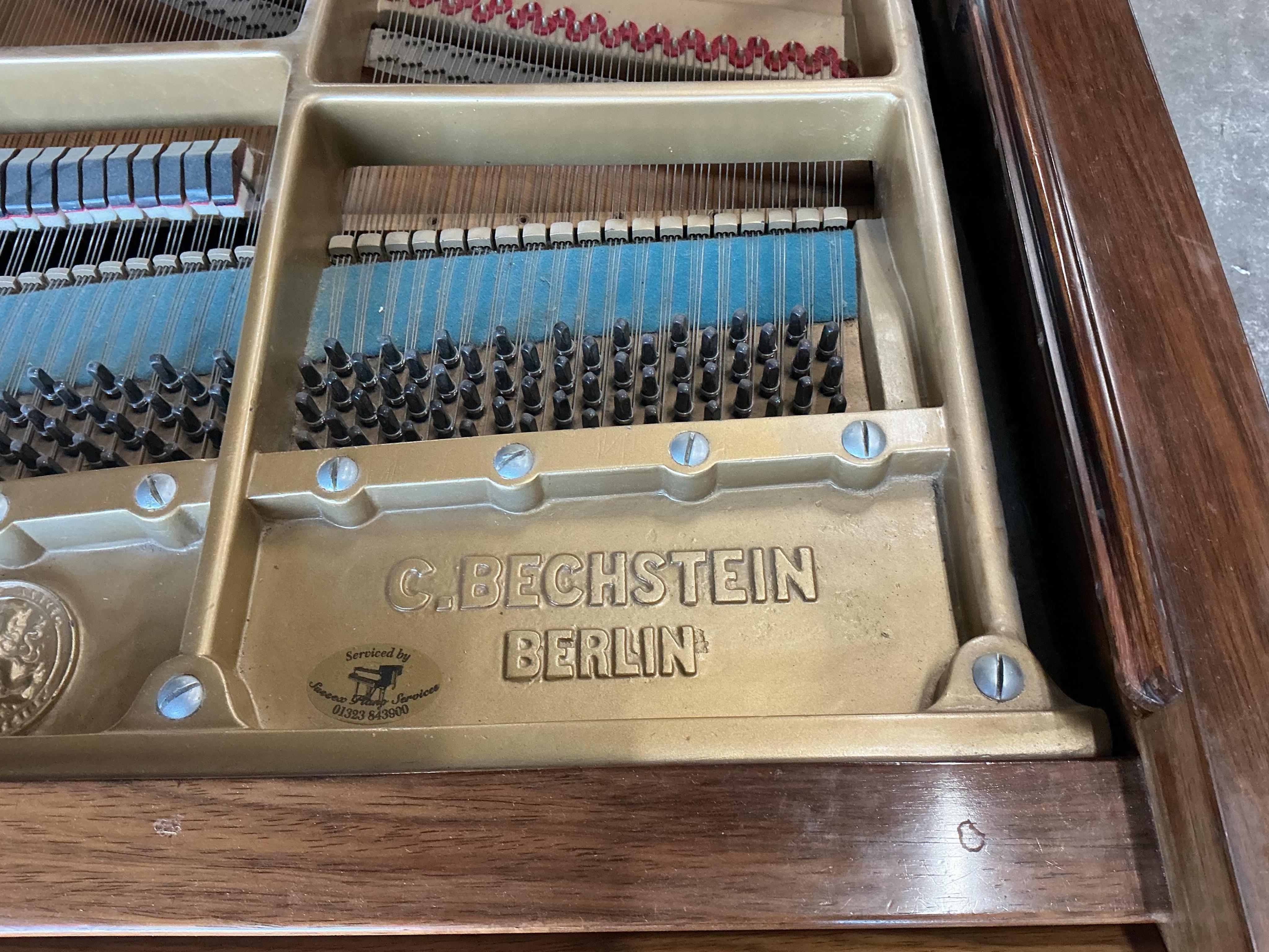 An early 20th century Bechstein 6ft. 8in. rosewood grand piano retailed by Harrods and duet piano stool, Provenance: Owned by Sally Matthews (internationally renowned Opera singer)